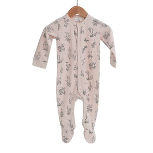 Newborn sleep suit in blush pink with meadow design