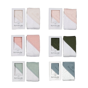 6 different coloured organic baby hooded towels in box package.
