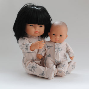 doll onesie sleep suit for 38cm doll. Two dolls dressed in onesie- one with long hair, one with no hair.
