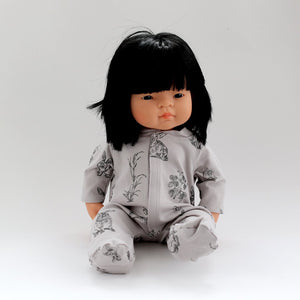 Baby and doll matching outfits. Grey burrowers onesie sleep suit. Doll with mid length black hair and fringe.